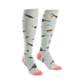 A pair of women's knee-high socks in light gray with a pattern of colorful birds and leaves. Coral-colored heel and toe.