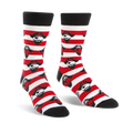 A pair of crew socks in red and white stripes, featuring repeating illustrations of a pirate's face.