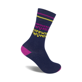dark blue crew socks with yellow and pink "empower women" knit-in message; pink and yellow striped cuff.    