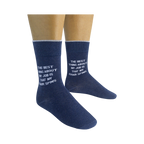 Lifestyle shot of a person wearing a pair of navy blue 'The best thing about my job is that my chair spins' socks.