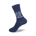 Flatlay image of two navy blue socks with the quote 'The best thing about my job is that my chair spins.'