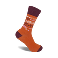 Crew socks in burnt orange and maroon. The design features the text 'I'm Pretty Bitchin' in the Kitchen' with a whisk graphic.