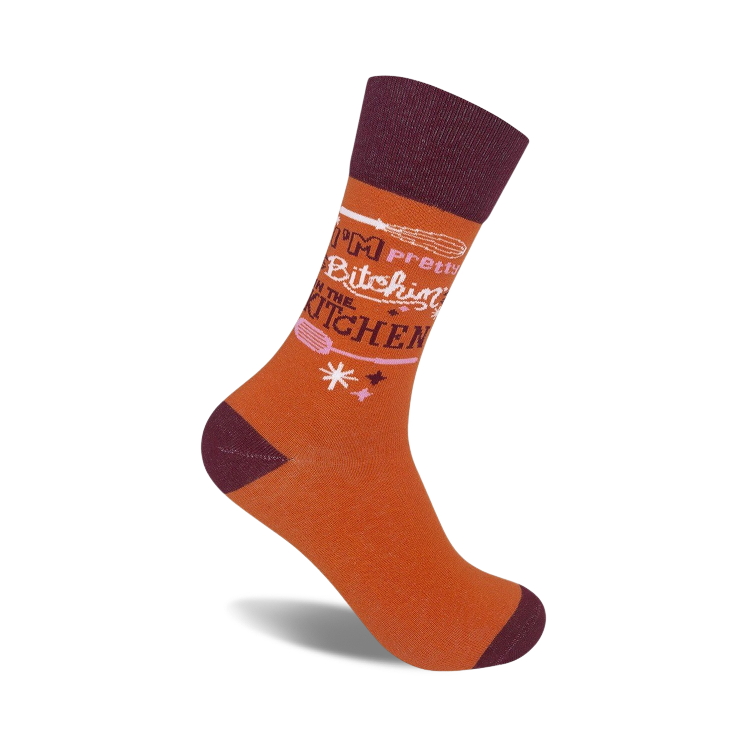 Crew socks in burnt orange and maroon. The design features the text 'I'm Pretty Bitchin' in the Kitchen' with a whisk graphic.