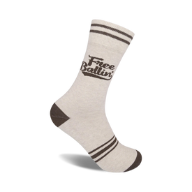 white crew socks with brown stripes and the words "free ballin'" written in brown.   