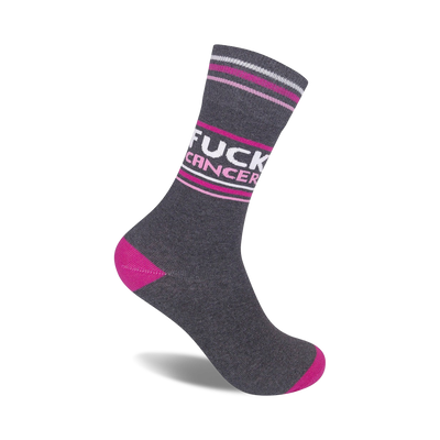 gray crew socks with '{fuck cancer}' in large pink letters, pink heel and toe.   