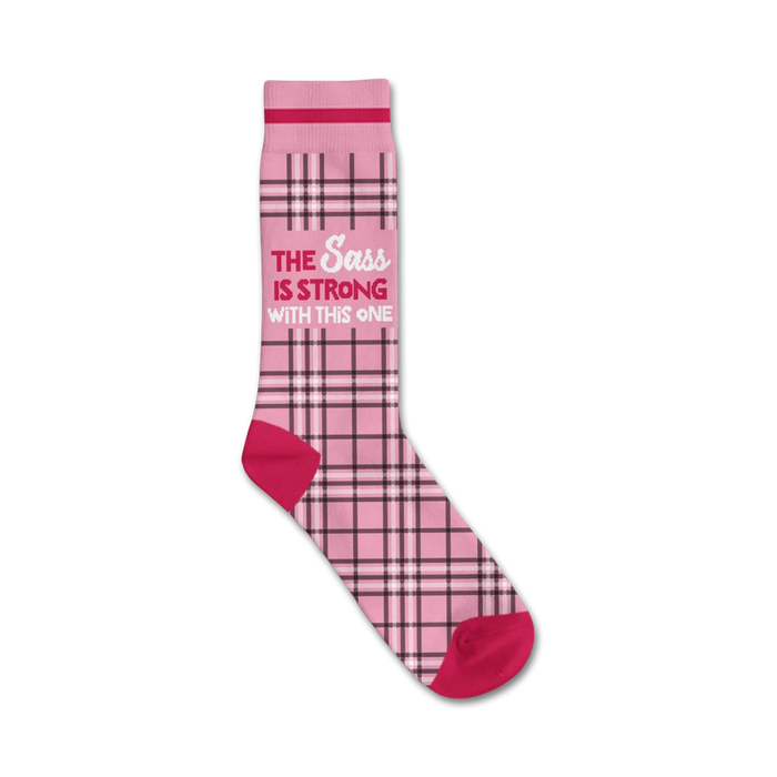 pink crew socks with plaid pattern and inscription that reads 'the sass is strong with this one'.   }}