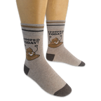 Mannequin legs wearing tan crew socks displaying a happy poop cartoon and I POOPED TODAY! text on the outer sides.