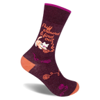 Dark burgundy crew sock with an orange heel and toe. Features a white cat tangled in yarn and text Fluff around & find out.