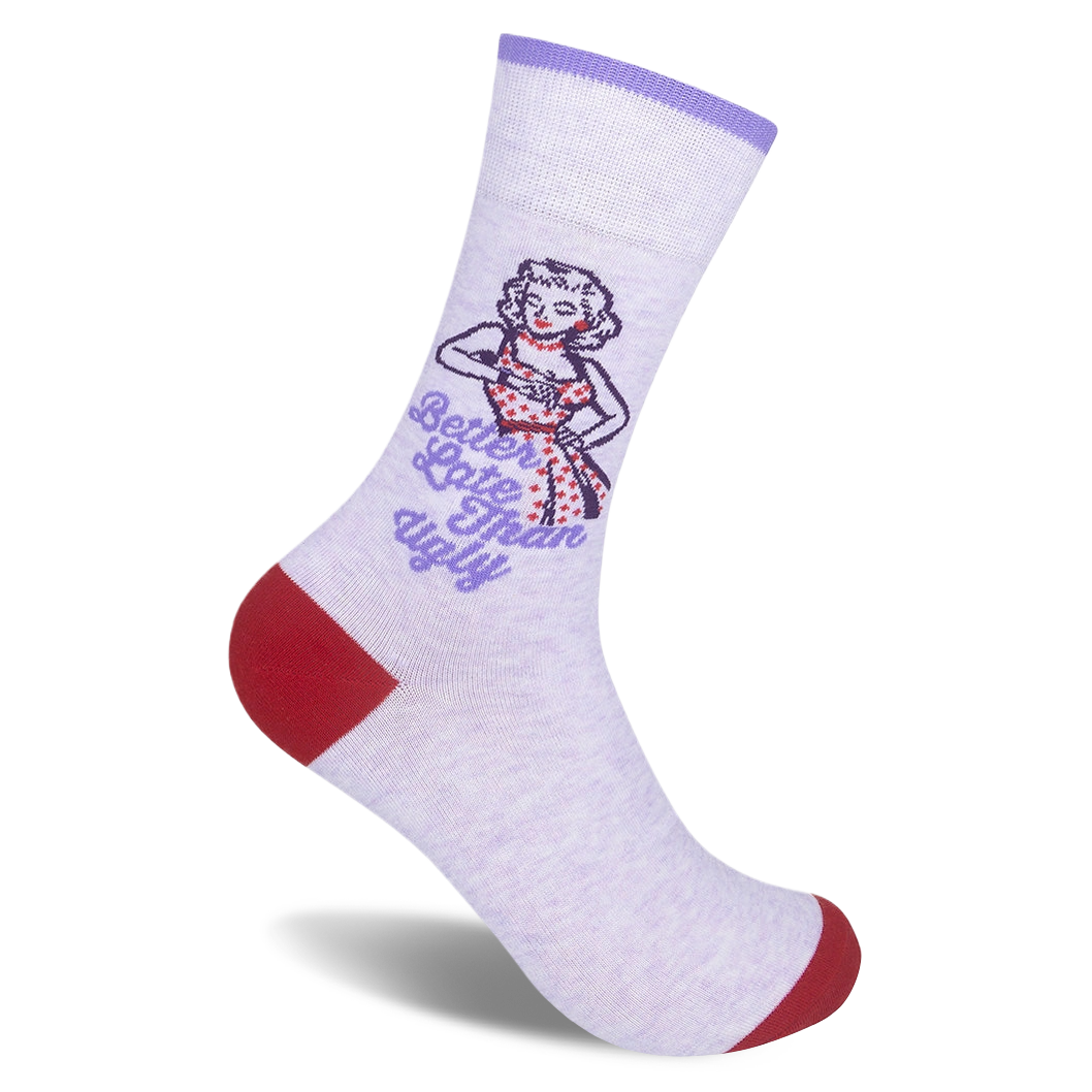 Light purple crew sock featuring a retro woman checking her watch, the text Better Late Than Ugly, and red toe and heel.