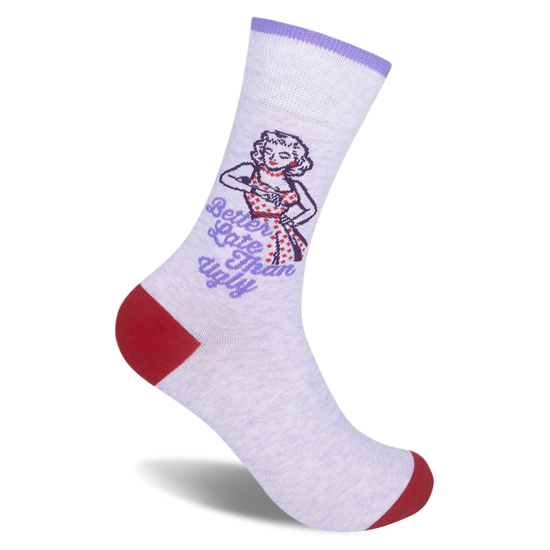 Light purple crew sock featuring a retro woman checking her watch, the text Better Late Than Ugly, and red toe and heel.