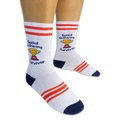 Person wearing light grey crew socks featuring red stripes, blue heels, and a yellow trophy reading Social Gathering Survivor.