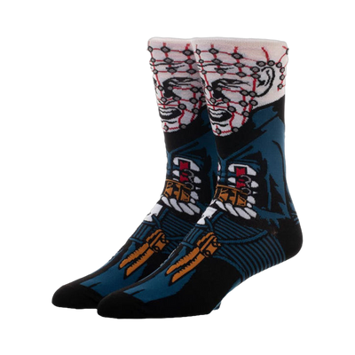 Pair of crew socks, black and teal, featuring a 360-degree image of Pinhead from Hellraiser.