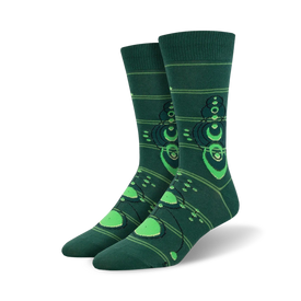 dark green men's crew socks with a pattern of crop circles in a lighter shade of green.  