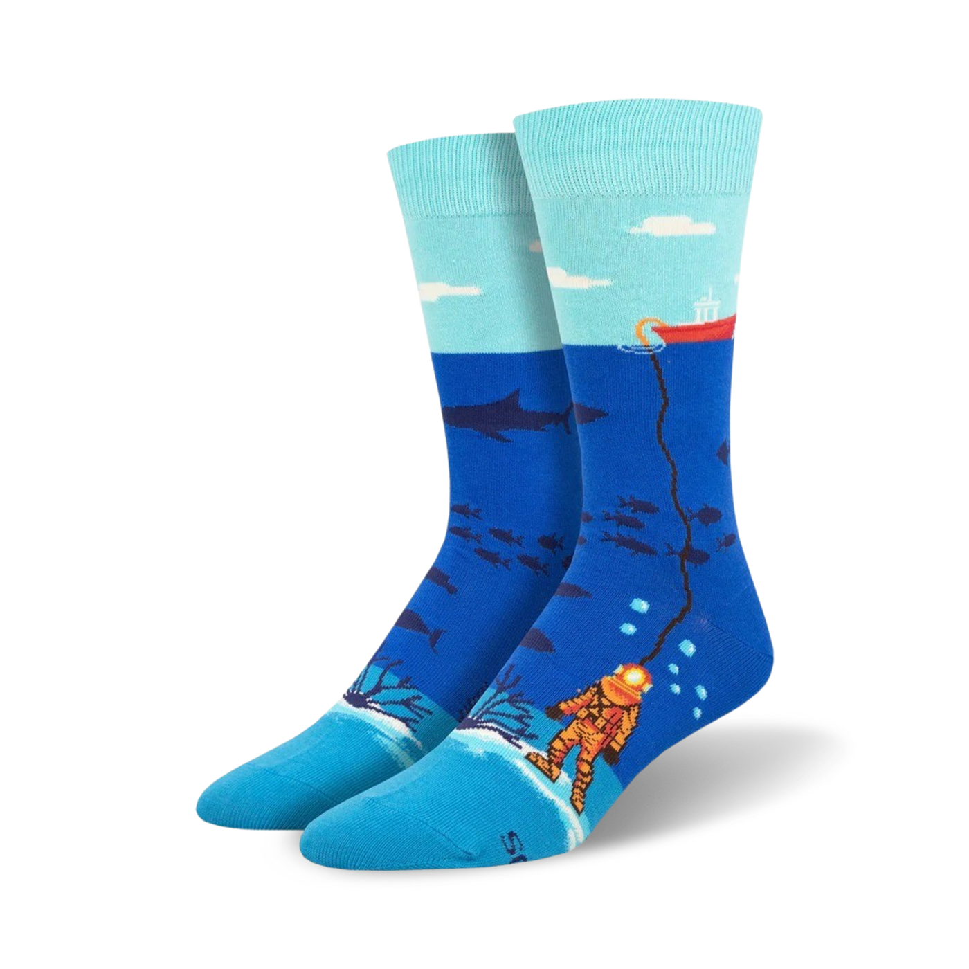 Crew socks in teal, blue, and orange.  Design features a deep sea diver, sharks, and other ocean life.  A red boat is visible on the surface.