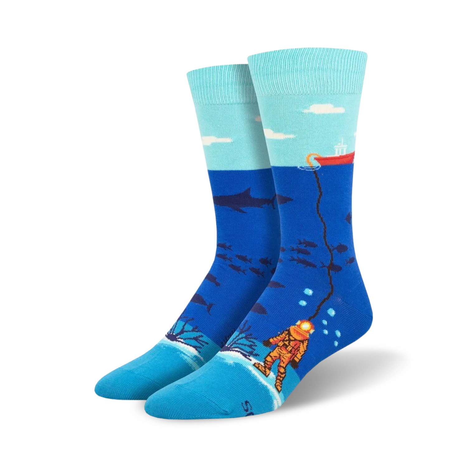 Crew socks in teal, blue, and orange.  Design features a deep sea diver, sharks, and other ocean life.  A red boat is visible on the surface.