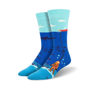 mens blue crew socks; deep sea diver pattern; shark and fish; yellow helmet and suit; red boat.  