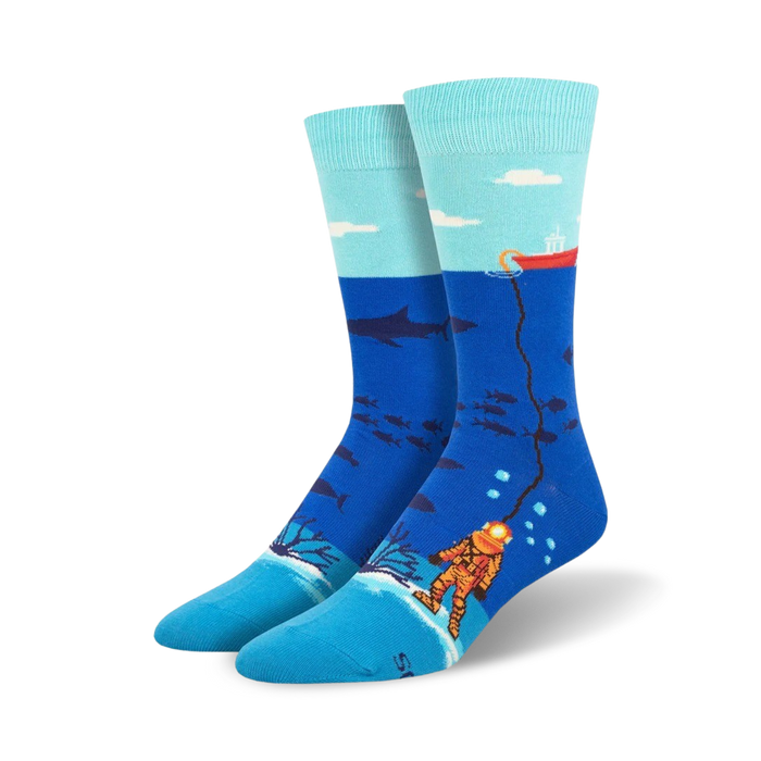 mens blue crew socks; deep sea diver pattern; shark and fish; yellow helmet and suit; red boat.   }}
