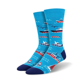 mens don't rock the boat socks in red, white, & blue boat pattern on blue background with seagulls. crew length.  