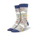 Pair of crew socks; light grey and blue; airplanes, parachutes, and clouds pattern.