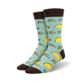Pair of crew socks; light teal, brown cuffs; all-over print of yellow tacos and 'Taco Tuesday' text.
