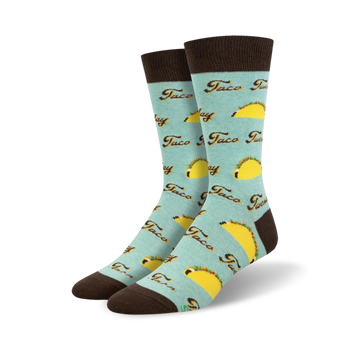 blue mens crew socks with allover pattern of smiling cartoon tacos.   