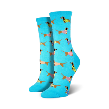 blue crew socks with a pattern of cartoon dachshunds wearing sweaters.  