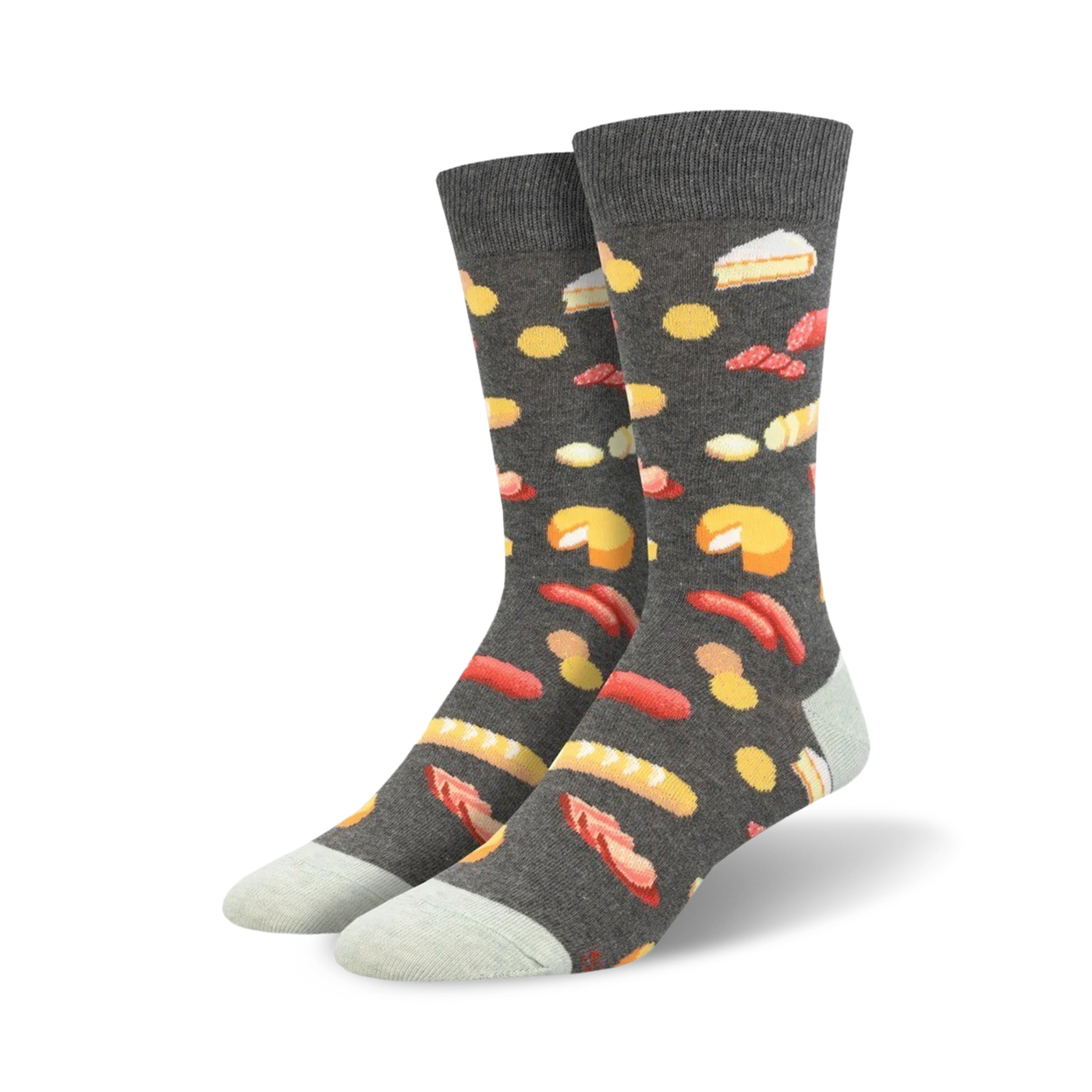 Pair of crew socks with a charcuterie board design.  Dark grey background with illustrations of cheese, sausage, bread, and other charcuterie items in yellow, red, and white.