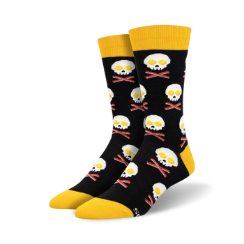 black crew socks with bacon and eggs pattern, yellow toe, heel, and top.  eggs are shaped like a skull and bacon like crossbones