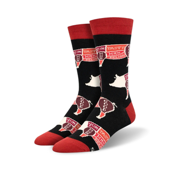 black crew socks with red toe, heel and top feature a white outline of a pig on each sock.  