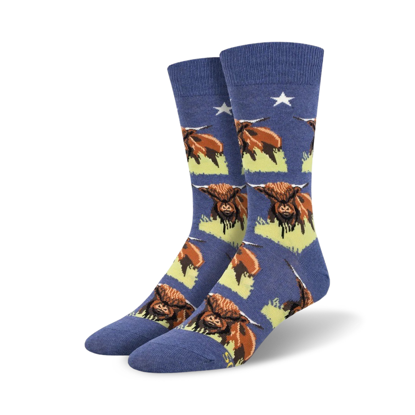 Pair of blue crew socks with a repeating pattern of Highland Cows.  The cows are brown and white, set against a pale yellow background.