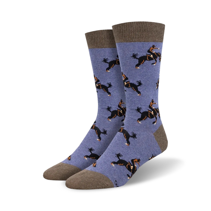 blue crew socks featuring a pattern of cowboys riding bucking horses.   