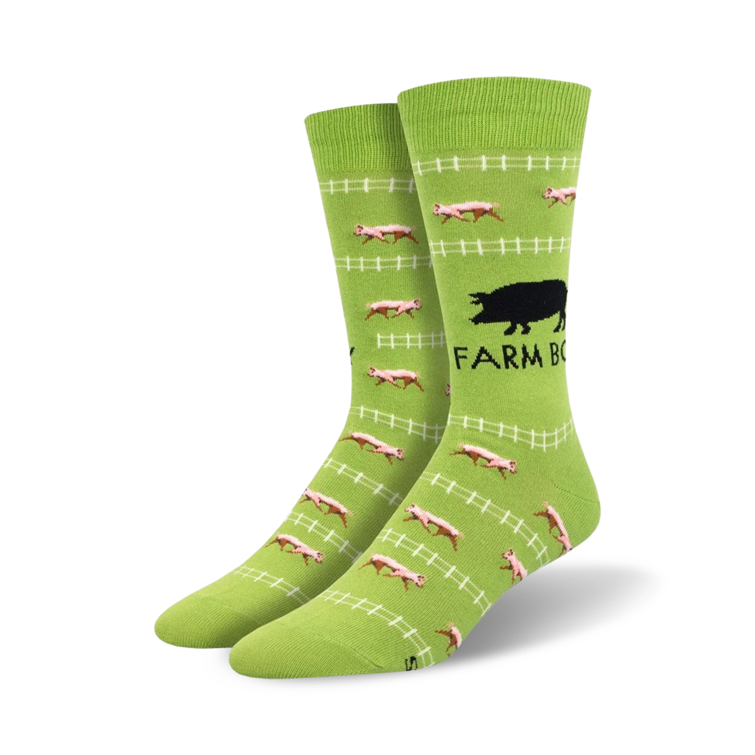 Pair of lime green crew socks. Design features pink pigs running along a white fence, with a black pig silhouette and 'Farm Boy' text.