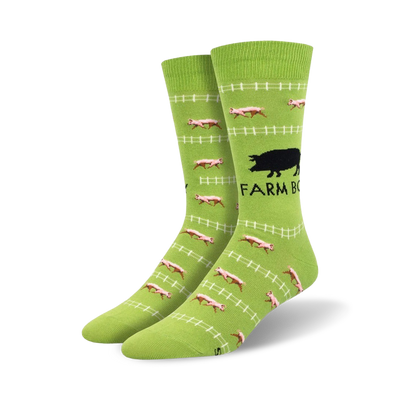 green crew socks with pink pig wearing black collars and a black pig wearing a black hat, and the words 'farm boy' in black.  