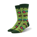 A pair of crew socks on a white background. The socks are lime green with a repeating pattern of teal and red tractors.