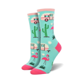 Pair of crew socks in teal, featuring pink flamingos, cacti, and retro camper vans. Fun, summery design.