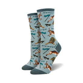 light blue crew socks with pattern of running tortoises and hares. womens. spring theme.  