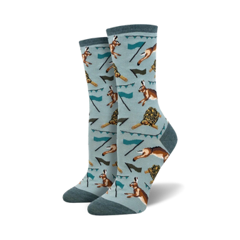 light blue crew socks with pattern of running tortoises and hares. womens. spring theme.  