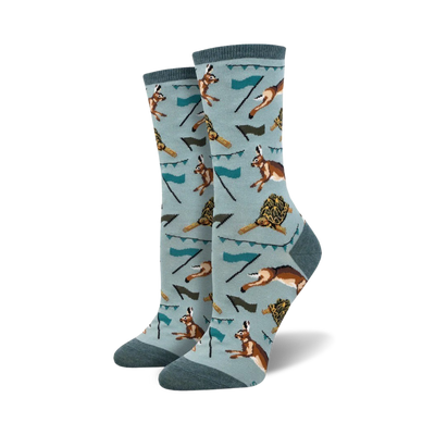 light blue crew socks with pattern of running tortoises and hares. womens. spring theme.  