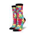 Pair of women's crew socks with a colorful puzzle piece design. The main colors are red, yellow, blue, and green.