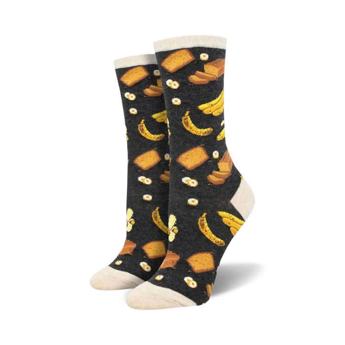 black crew socks covered in a cartoonish pattern of bread slices and bananas.    }}