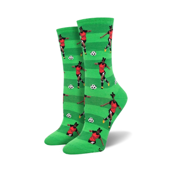 green crew length women's soccer socks with a female soccer player in action pattern.  