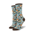 Pair of crew socks, teal and brown, with a repeating pattern of illustrated mushrooms and leaves.