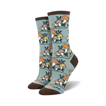 blue crew socks with an allover pattern of brown mushrooms with yellow and orange caps, arranged in horizontal rows with green leaves between each row.  