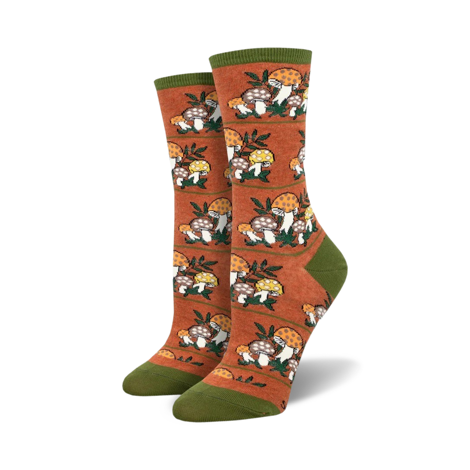 Lifestyle photo showing the orange Magic Mountain socks on a person's feet, suggesting outdoor or nature-related activities.