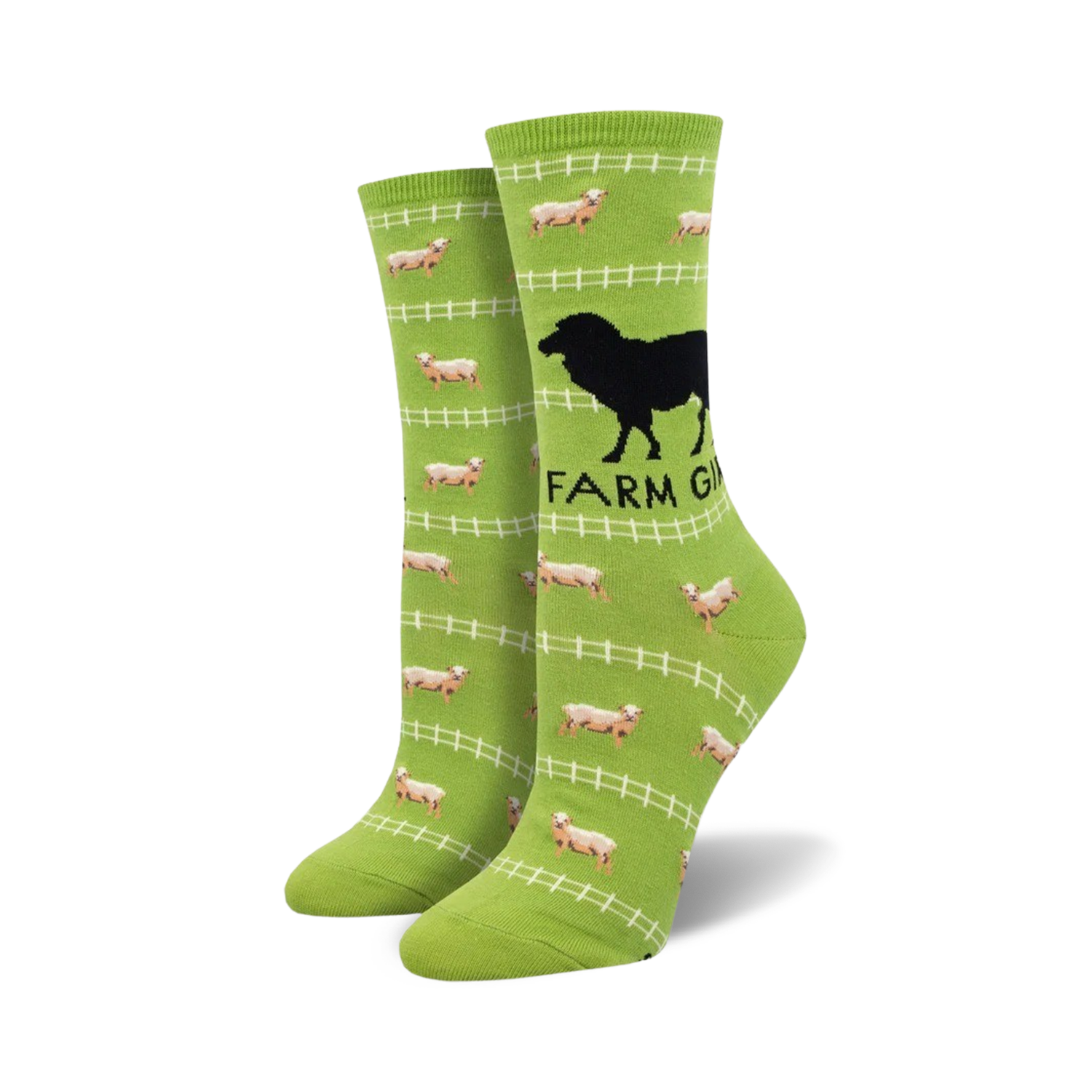 Lime green crew socks with a repeating pattern of sheep, fences, and a black silhouette of a dog. Text says 'Farm Girl'.