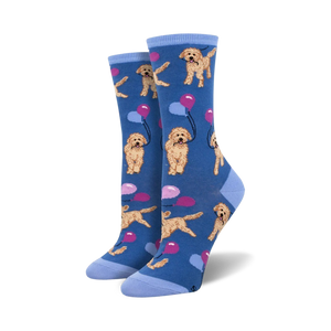 crew length women's socks featuring a pattern of golden doodle dogs wearing party hats and holding balloons on a blue background.   