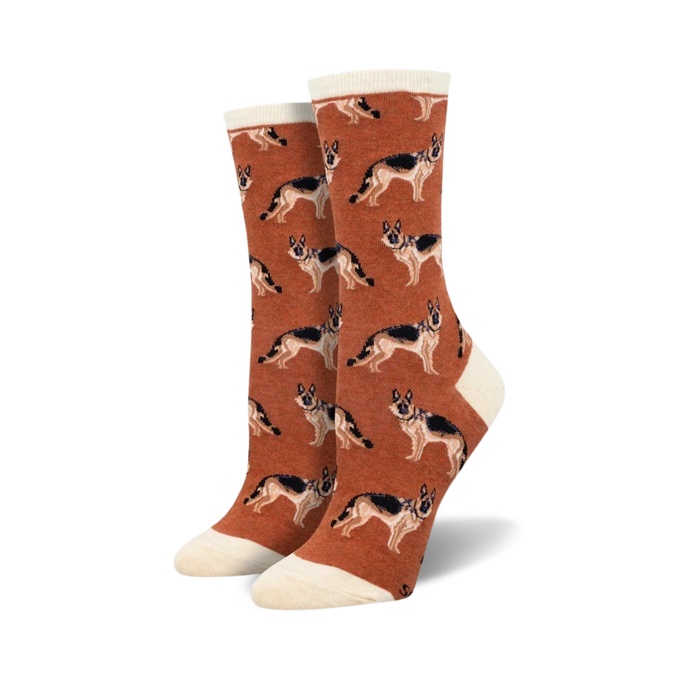 A pair of rust-colored crew socks with a repeating German Shepherd pattern. The socks have a cream-colored cuff.