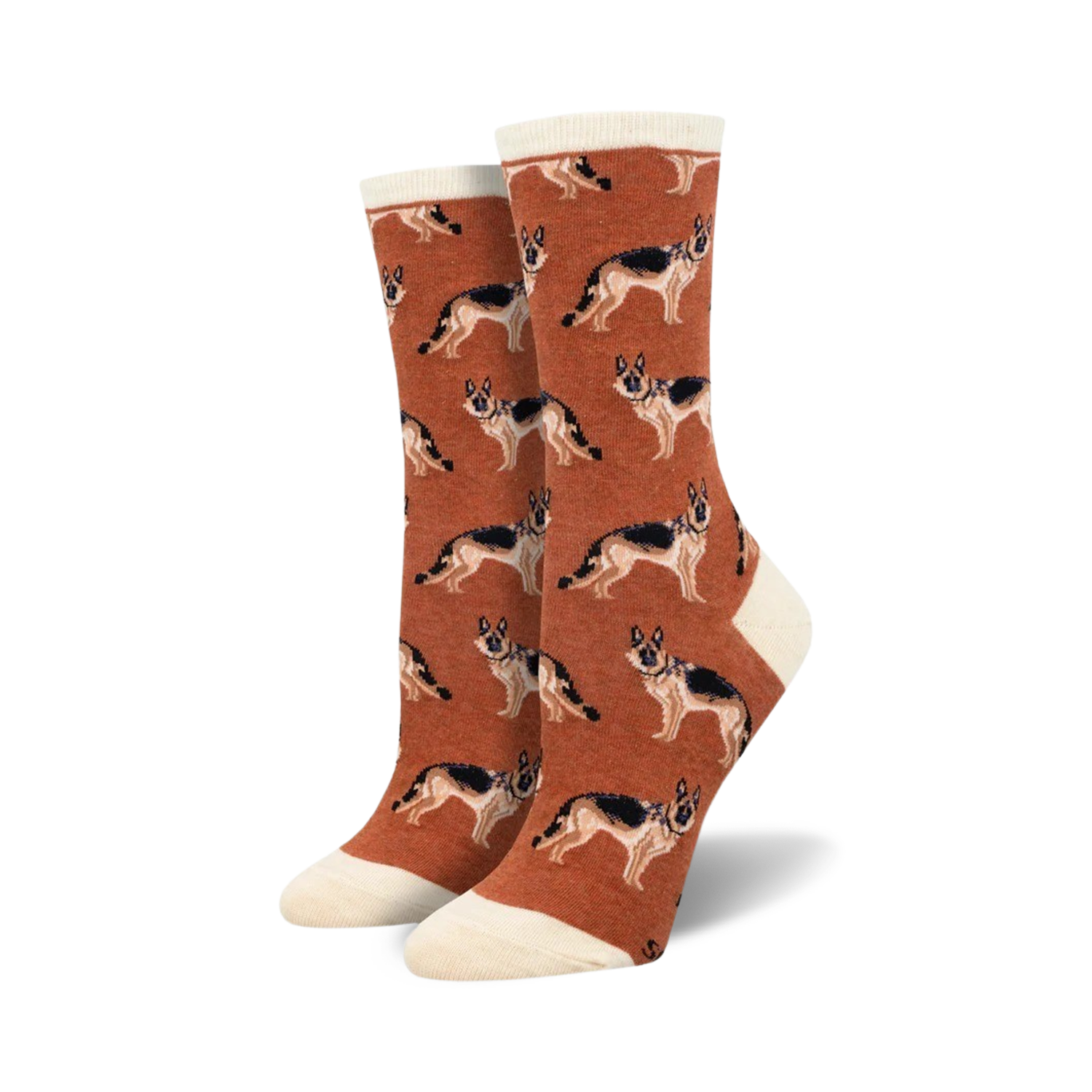 A pair of rust-colored crew socks with a repeating German Shepherd pattern. The socks have a cream-colored cuff.