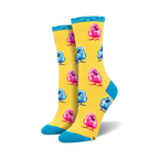 Pair of crew socks featuring a pattern of pink and blue chicks on a yellow background. Teal cuff detail.