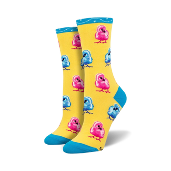 peep this! womens' crew socks in yellow with blue toes and heels have a cute multicolor baby chick pattern.    